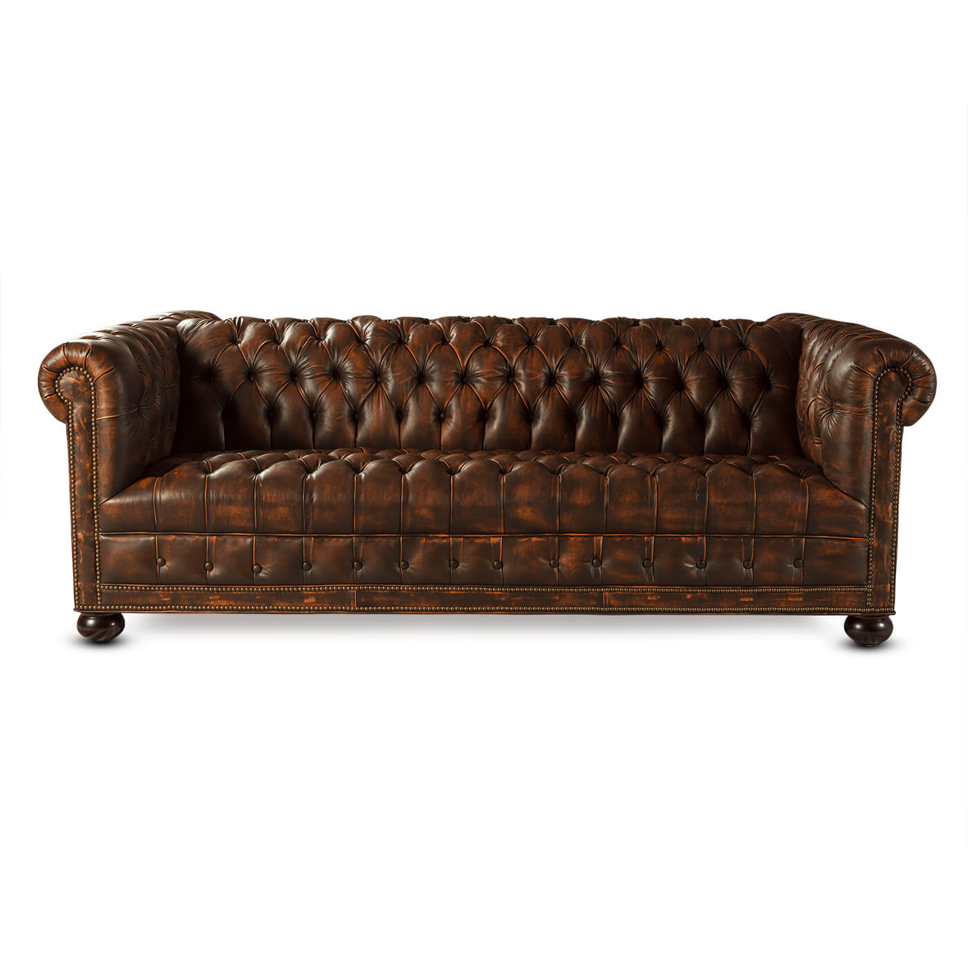 Full frontal Chesterfield sofa view with detailed leather texture.