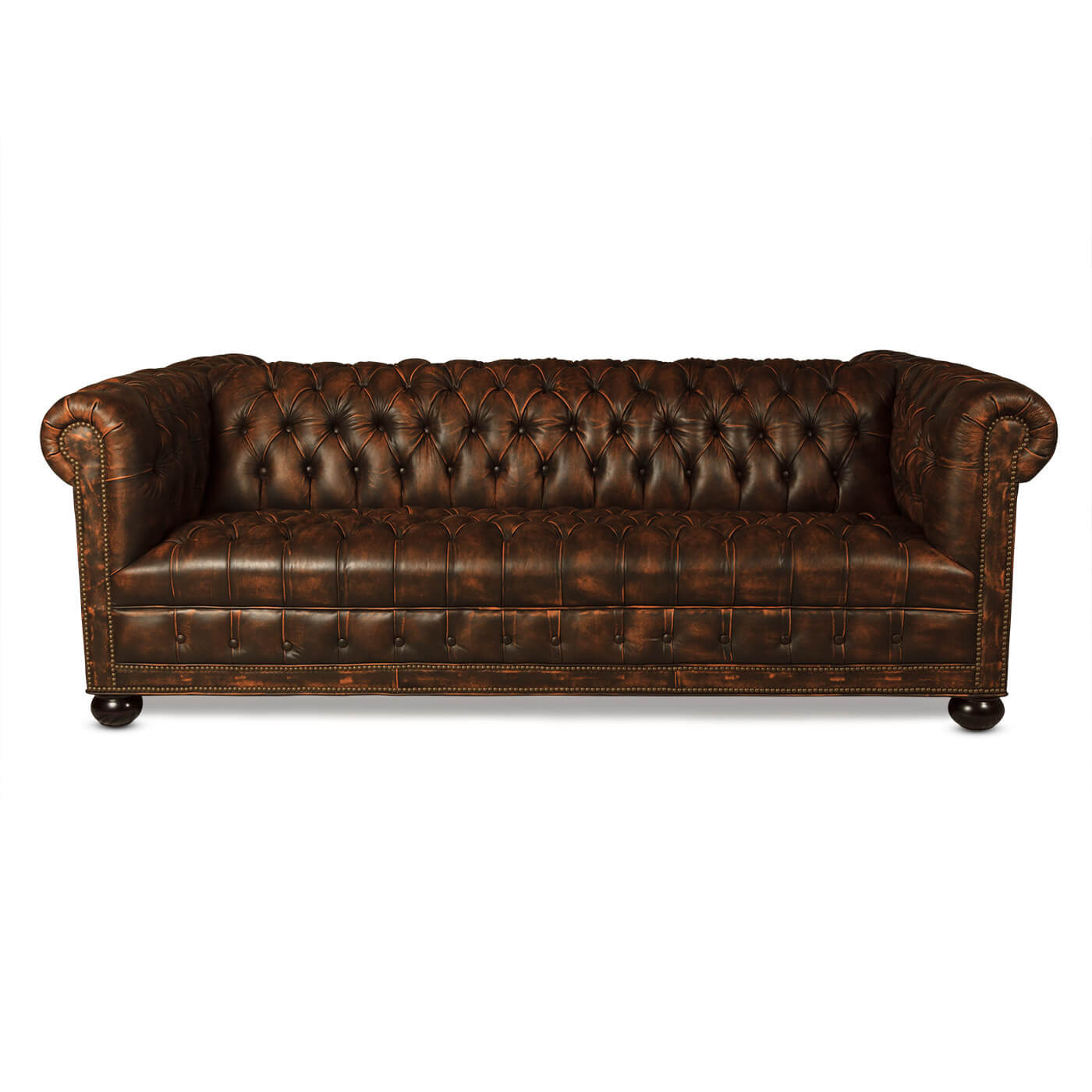 Frontal view of tufted leather Chesterfield sofa.