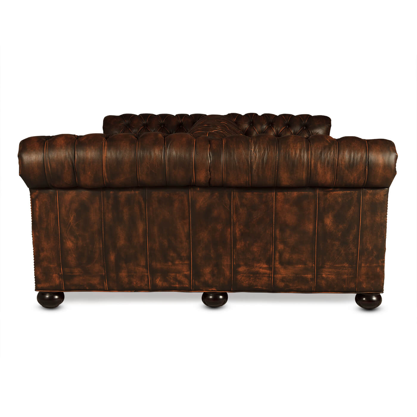 Back view of Chesterfield sofa with dark wooden legs.