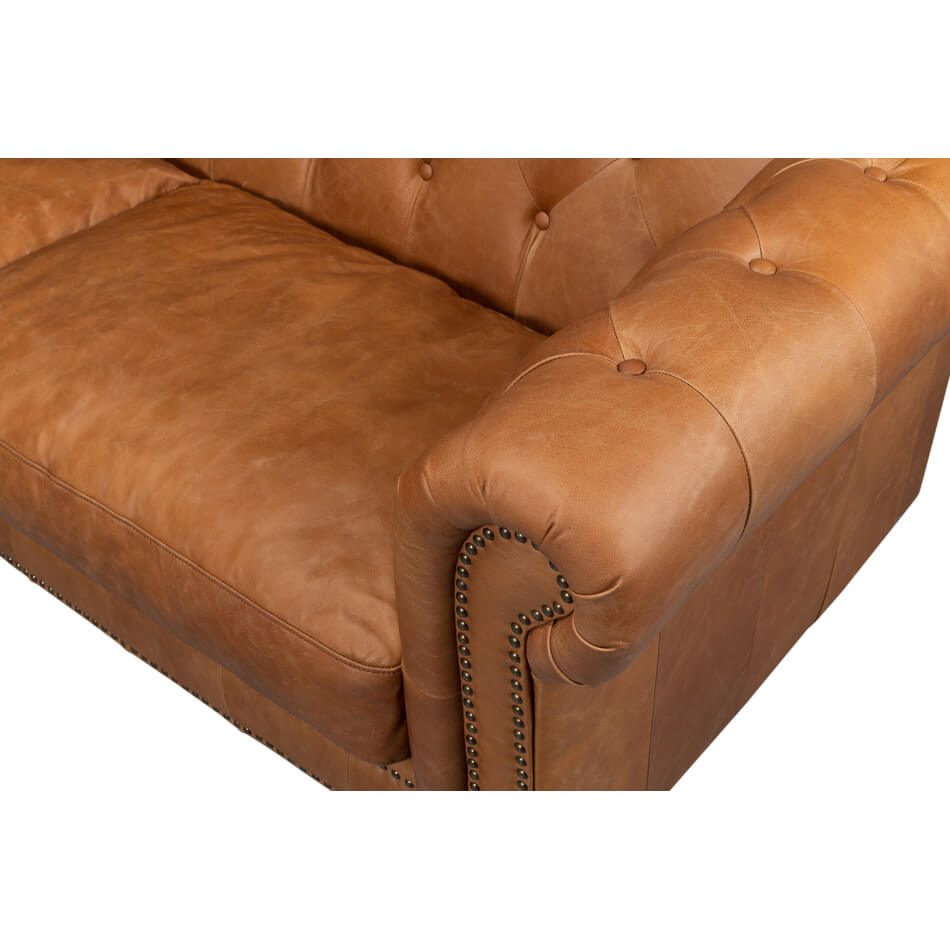 Close-up armrest and cushion chesterfield sofa.
