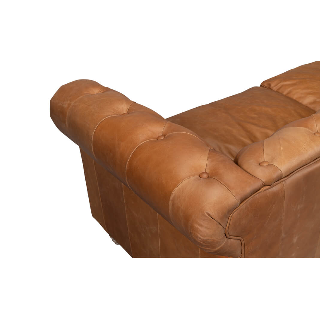 Close-up backrest tufted chesterfield sofa.