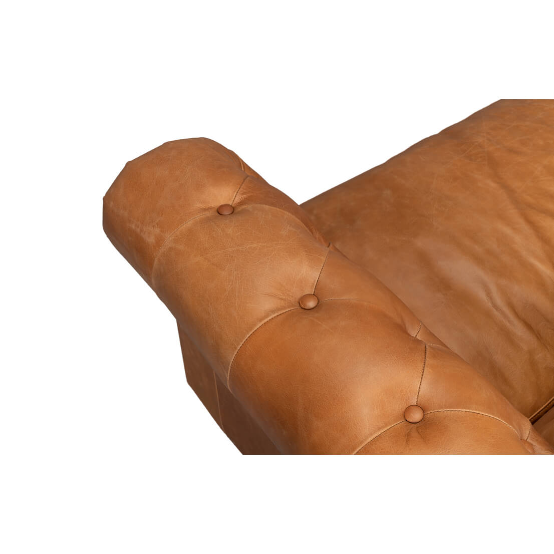 Close-up cushion details tufted chesterfield sofa.