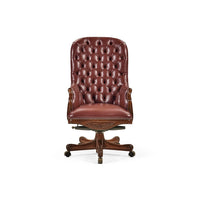 Tufted red leather swivel chair direct front view.