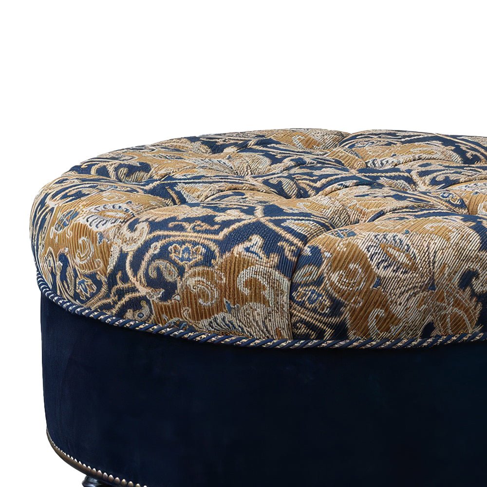 Close-up of tufted ottoman's detailed fabric and texture.