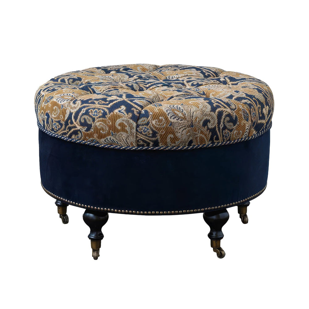 Tufted round ottoman on wooden legs, ornate design.