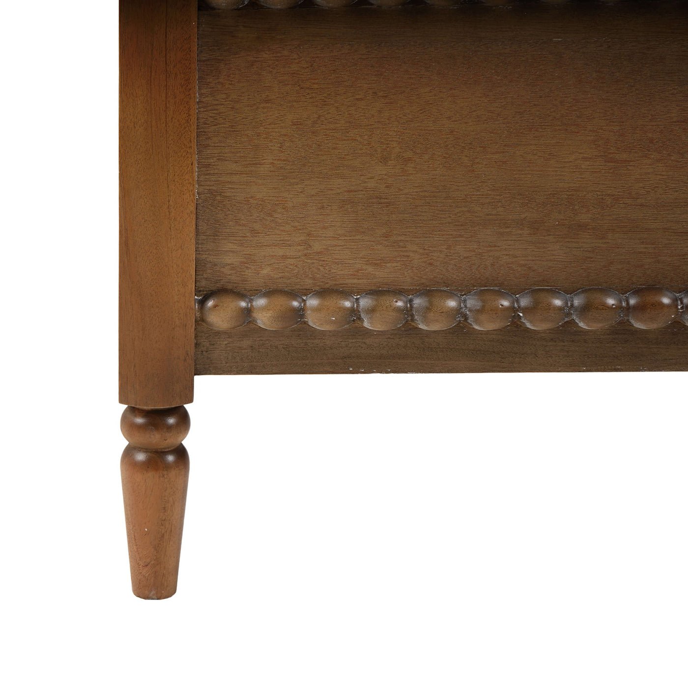 Close-up of wooden spindle bed leg and frame.