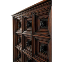 Close-up of Italian chest detailed drawer carving.