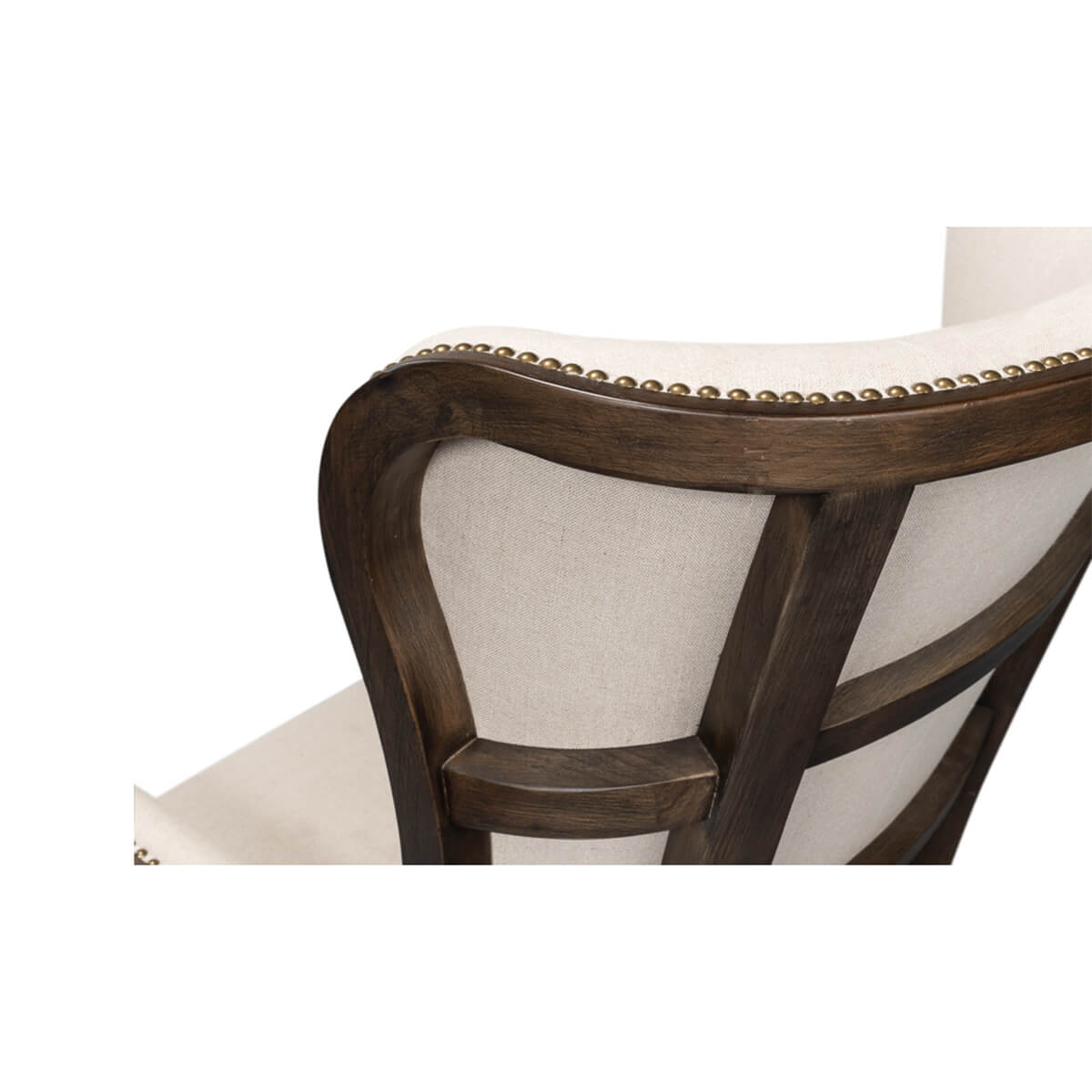 Detailed view of wooden frame on modern wingchair back.