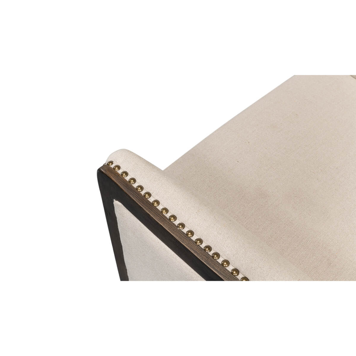 Top corner view of modern wingchair armrest.