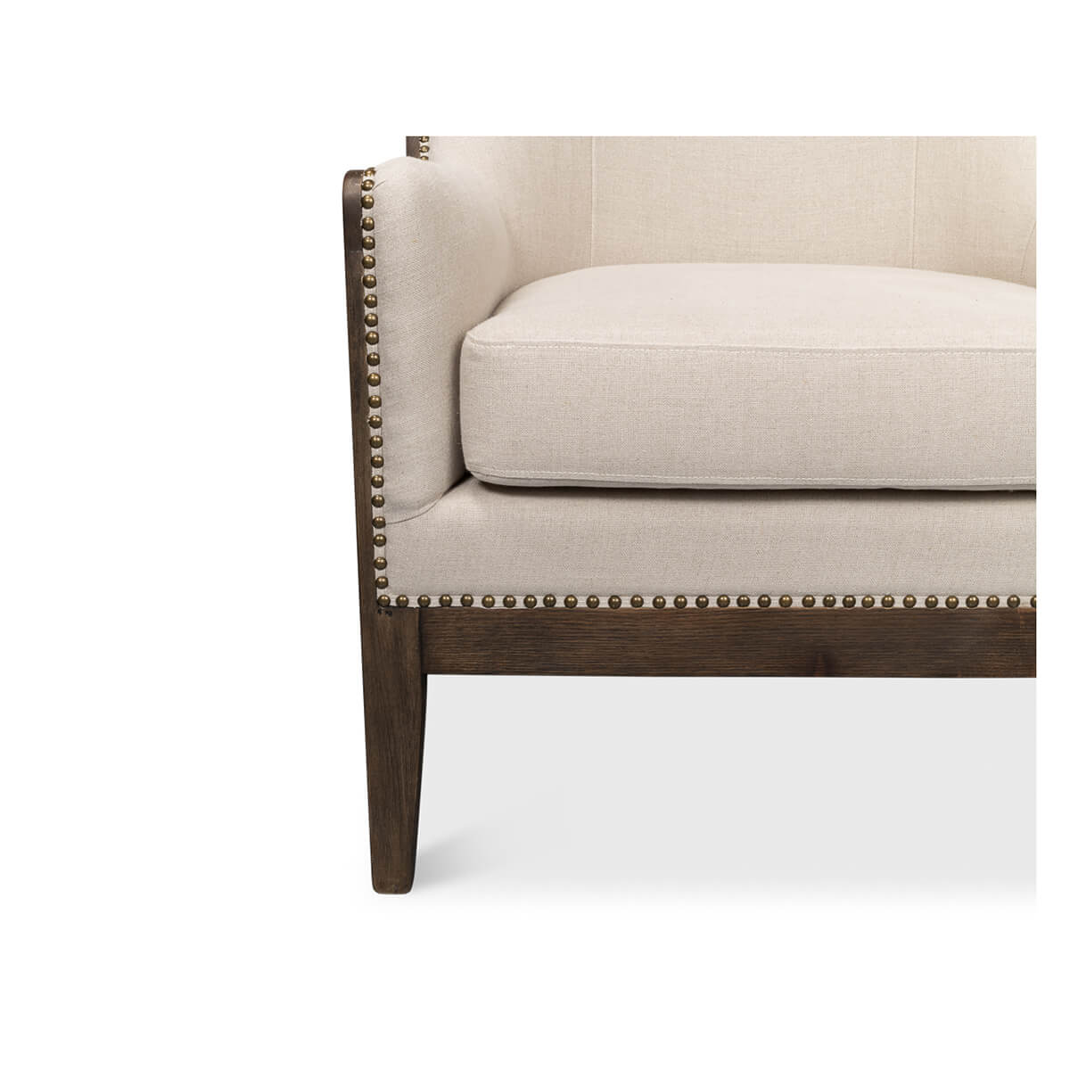 Close-up of seat cushion and stud detailing, wingchair.