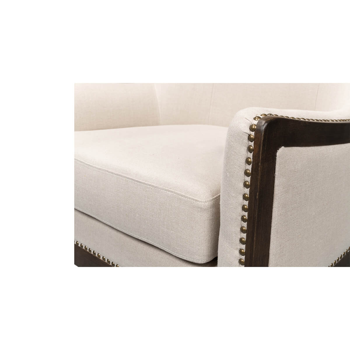 Armrest and cushion detailing on modern wingchair.