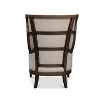 Back view of modern wingchair with wooden frame.