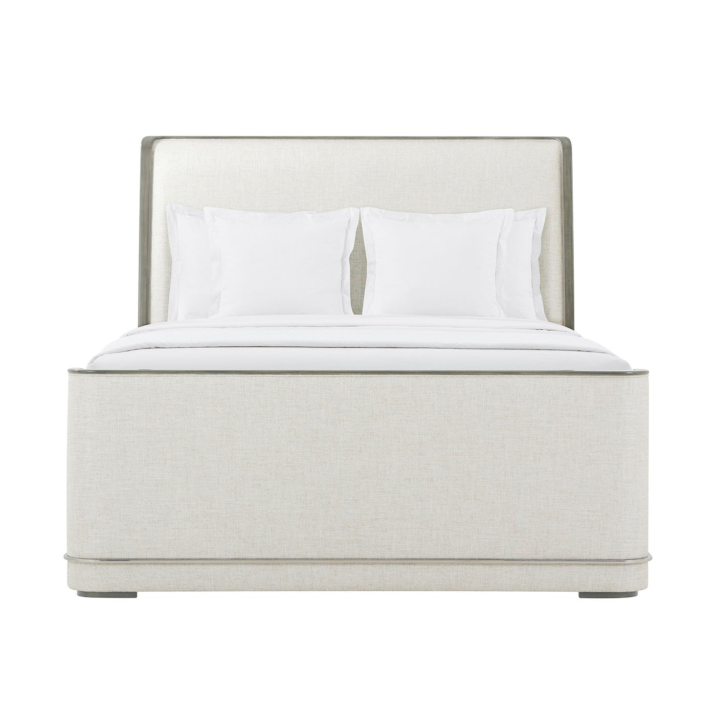 Front view of upholstered Art Deco bed with pillows.