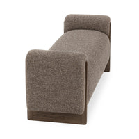 Angled end view of the Bronzed Cocoa bench showing its rounded upholstered arm and ash base