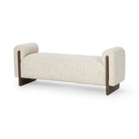 Angled view of the Sand upholstered bench with rounded arms and exposed ash end supports