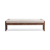 Front view of the upholstered bench showing its long pale cushion, brown apron and exposed wood legs