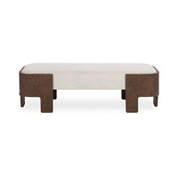 Front view of the upholstered bench showing its pale cushion and curved brown wrapped end supports