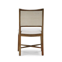 Upholstered chair, back view, showing wood and fabric details.