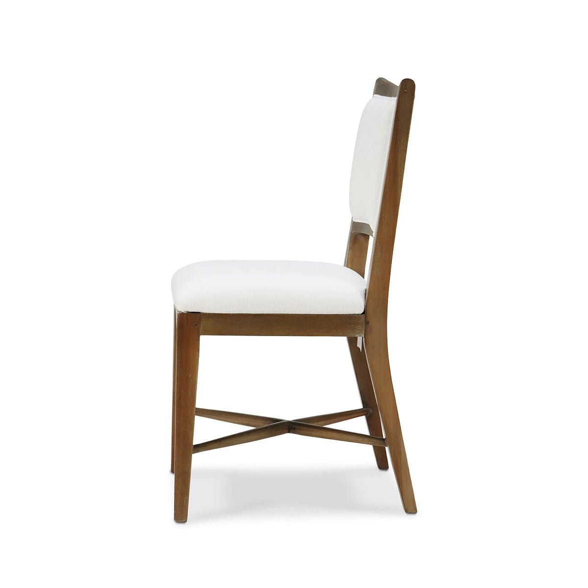 Classic dining chair, side profile, white cushion and wood frame.