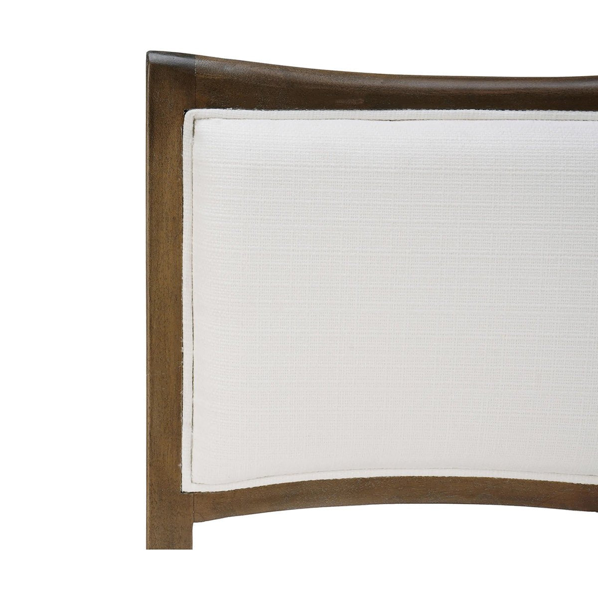 Close-up of dining chair backrest, white fabric and wood.