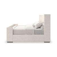 Side view of upholstered king size minimalist bed.