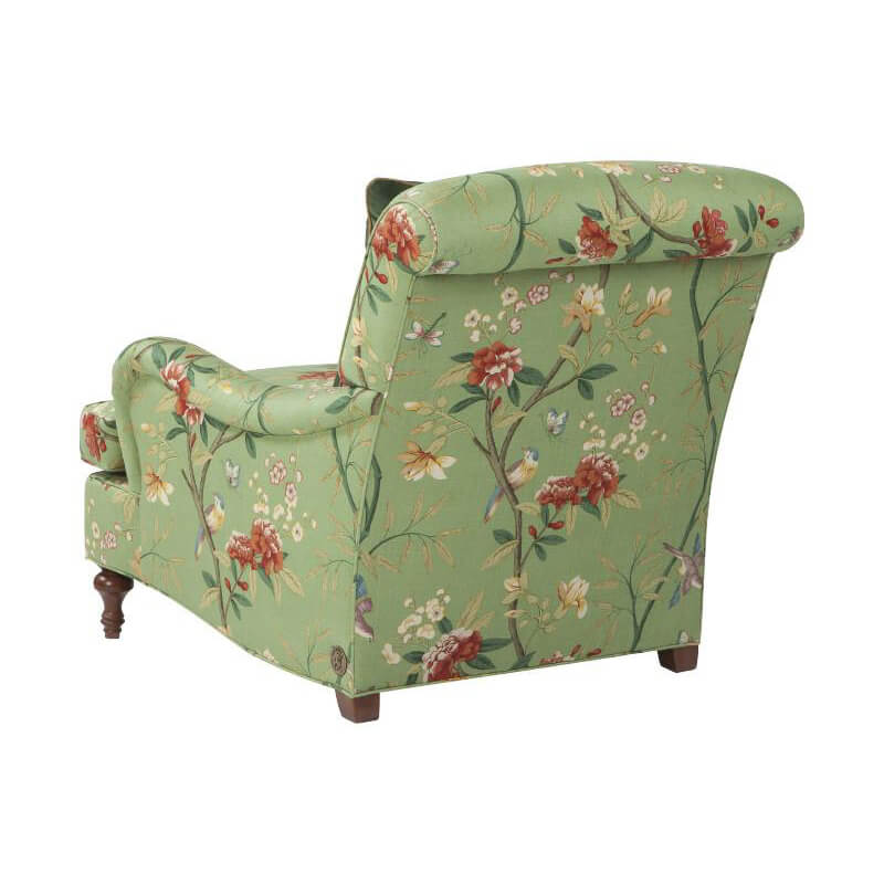 Back view of Victorian easy chair with floral pattern.