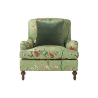 Front view of floral Victorian easy chair with cushion.
