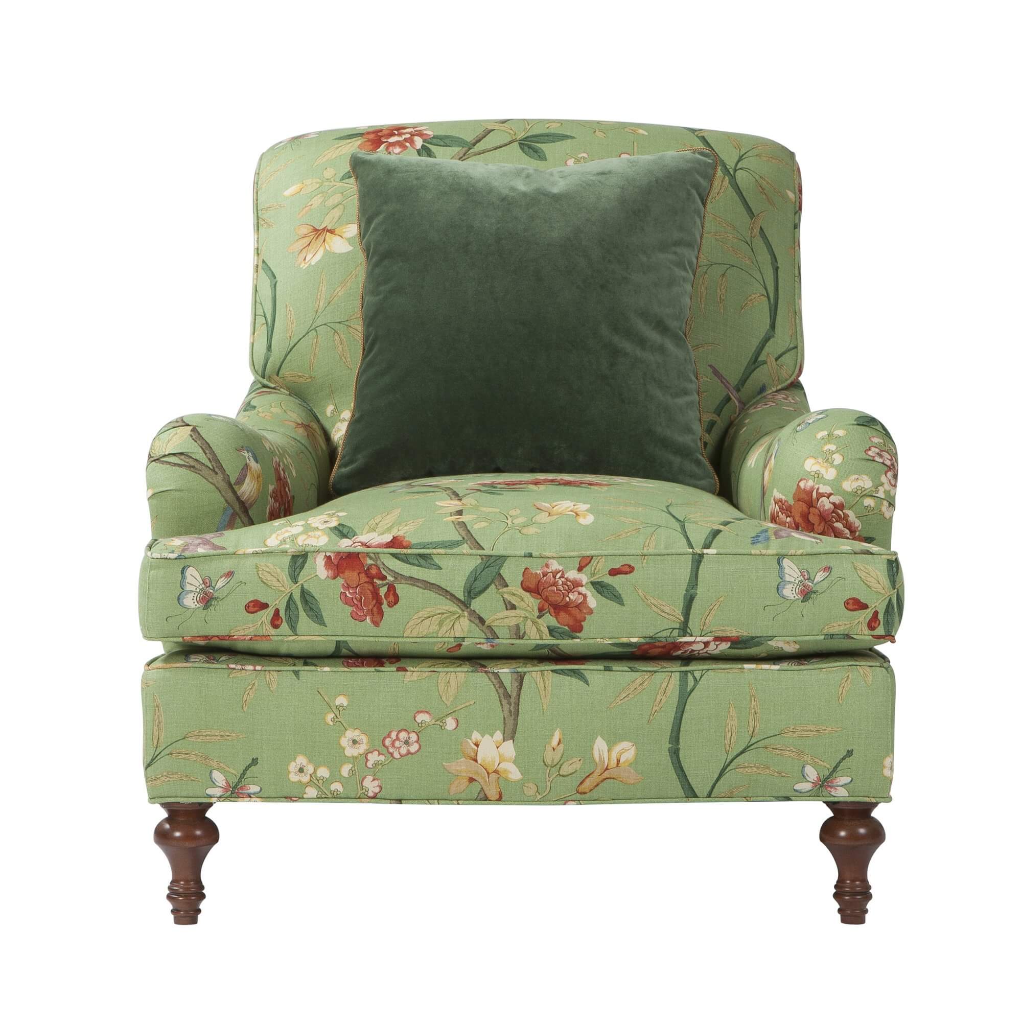Green floral Victorian-style armchair, front view cushion detail.