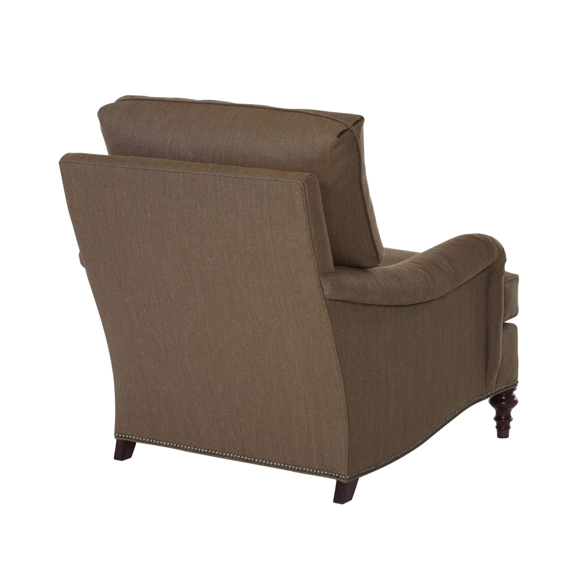 Brown Victorian-style armchair, back view wooden legs.