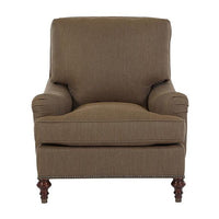 Brown Victorian-style armchair, front view nails detail.