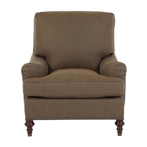 Brown Victorian-style armchair, front view nails detail.