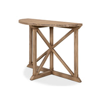 Angled side view of wood demilune console table.