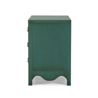 Side view of vintage green bedside chest.