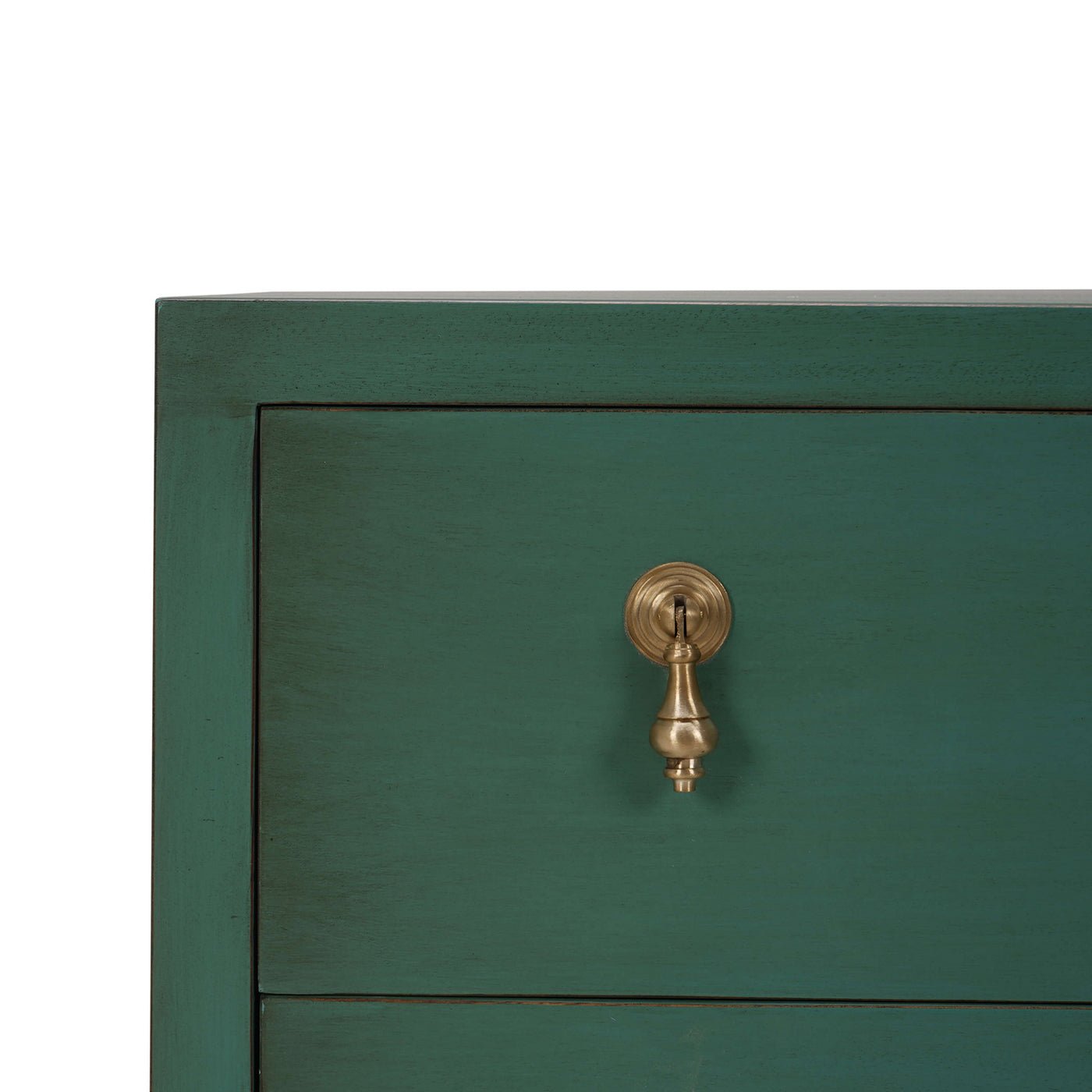 Corner detail of vintage green bedside chest drawer.