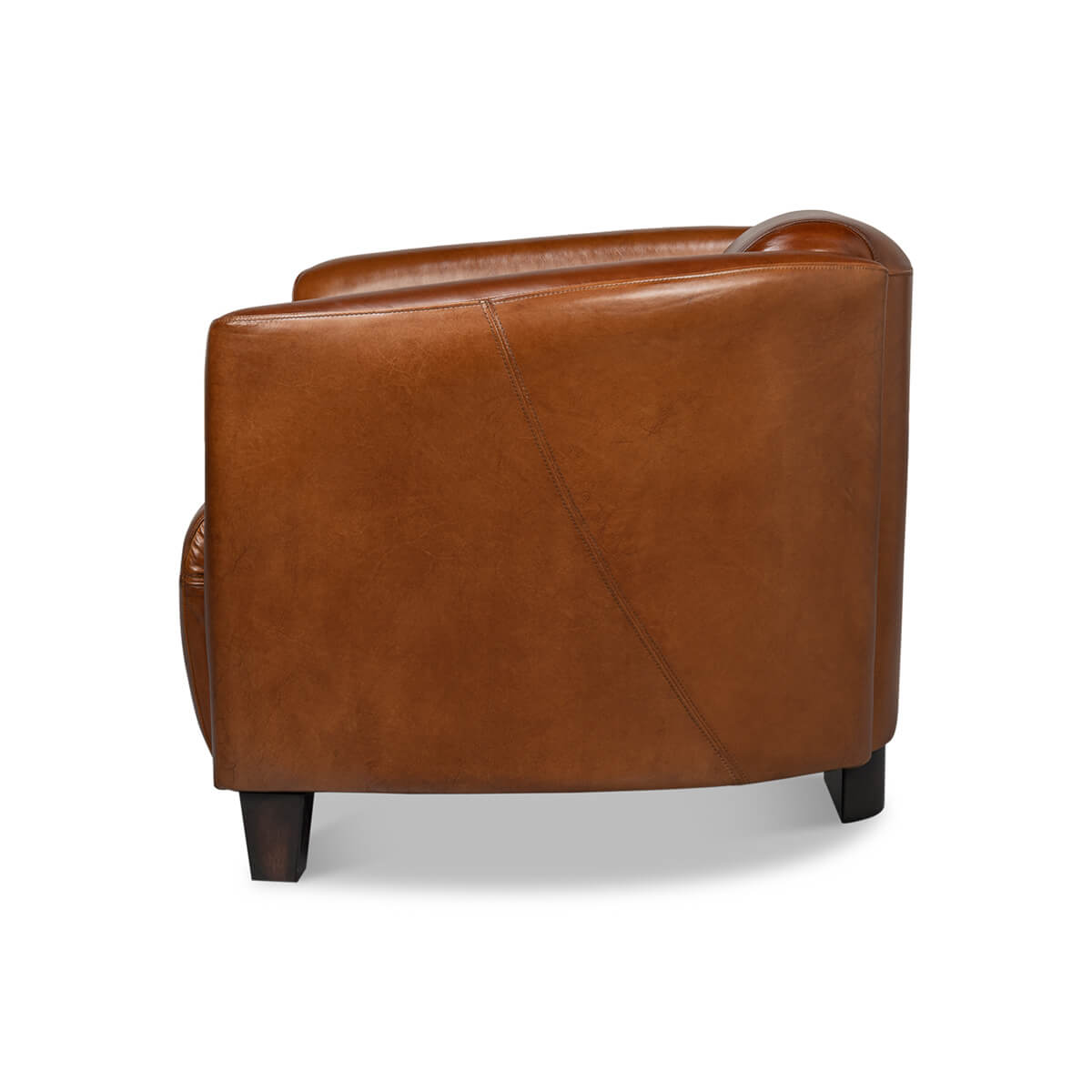 Brown leather club chair, opposite side view.