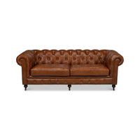 Vintage style Chesterfield sofa, front view.