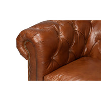 Vintage style Chesterfield sofa, armrest detail.