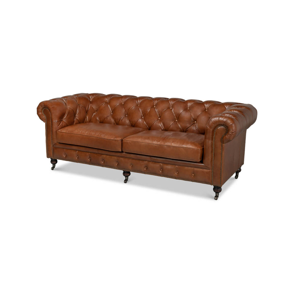 Vintage style Chesterfield sofa, front angle view.