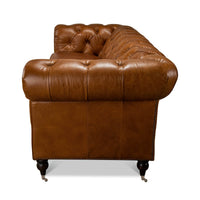 Side view of Chesterfield sofa, showcasing rolled arm.