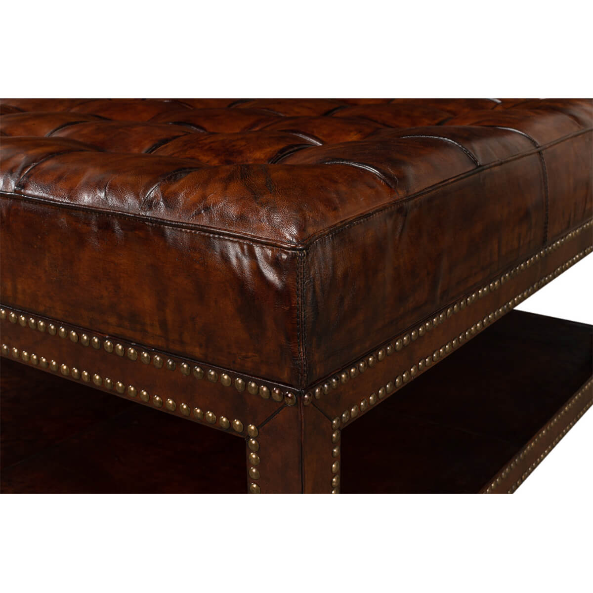 Leather ottoman corner and shelf detail view.