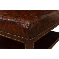 Leather ottoman corner and shelf detail view.