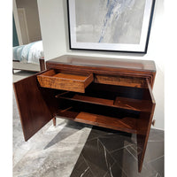 Open walnut Art Deco cabinet showcasing interior shelves and drawers.