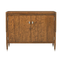 Head-on view of walnut Art Deco cabinet with closed doors.