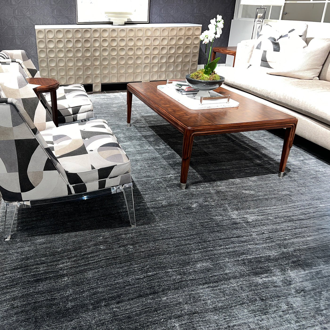Walnut Art Deco coffee table in elegant seating area.