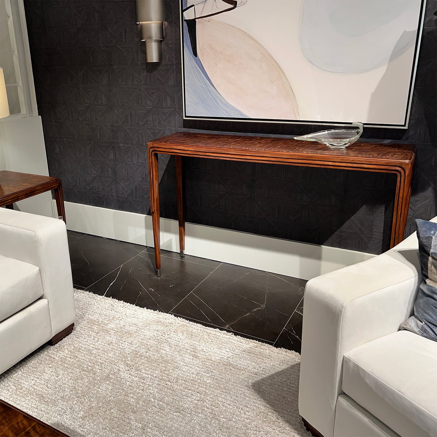 Console table in modern living room setting.