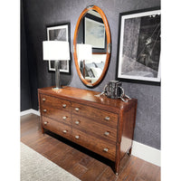 Stylish Art Deco dresser, room setting, lamp and decor.