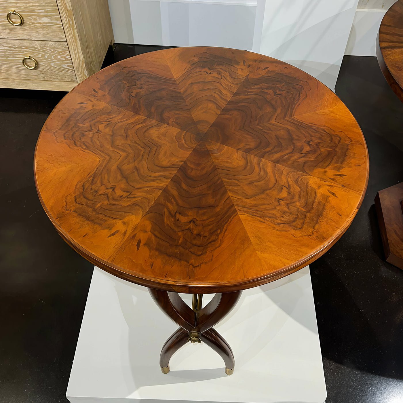 Top view of walnut Art Deco side table with pattern.