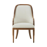 Front-facing art deco dining chair with upholstery.