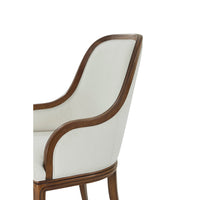 Close-up of armrest on art deco dining chair.