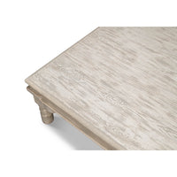 Close-up of table surface, washed gray finish.
